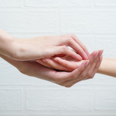 two hands holding with boundary